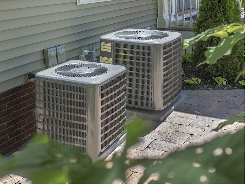 Multiple air conditioner units outside of a house in Cornelius